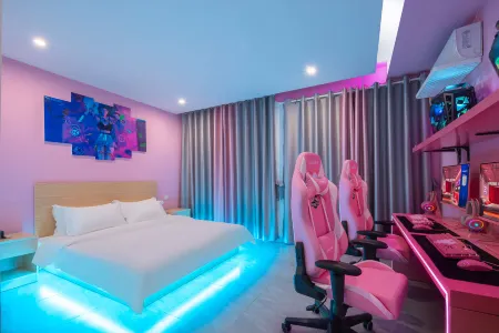 JH e-sports Hotel (Haikou Meilan International Airport Branch) Отели рядом с достопримечательностью «Qiongtai Normal University (Guilinyang Campus)»