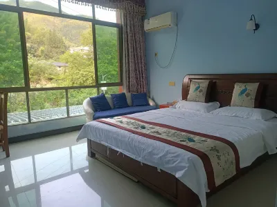 Zhou Loman Yougu Homestay Hotels near Huanglongda Canyon