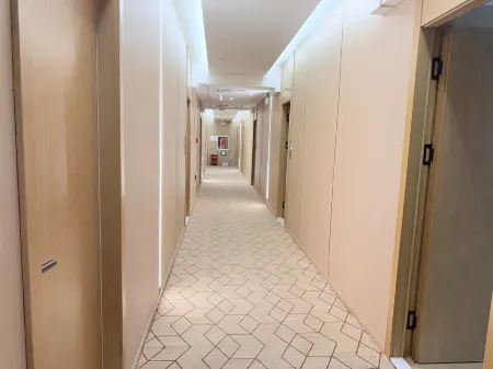 Yinli Hotel Отели в г. Шавань