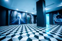 WE E-sports Hotel (Xinyang Railway Station)