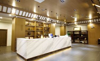 Quanpan Yaju Hotel (Qiannan Zhisheng Tangquan Building 5)