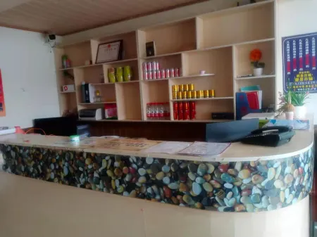 Cuoqin Leihao Business Hotel Отели в г. Цоцинь