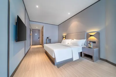 Qianxiang Shangmei Hotel(Zhengzhou Henan Technic University Metro Station) Отели в г. 