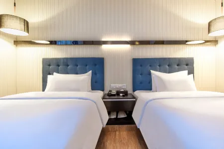 Jinbiyue Hotel (Guangzhou Panyu Shiqiao Branch) Отели рядом с достопримечательностью «Chenyong Park»