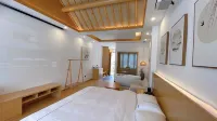 Fuyang Qijiang Bieyuan High-end Homestay (Raozhou Ancient Town Branch) 포양 호텔