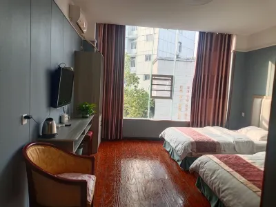Defu Business Hotel (Yilong Xinzhengzhen Branch) Hôtels à : Yilong