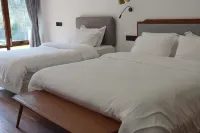 Pujiang Yishanmen Homestay Hoteles en Pujiang