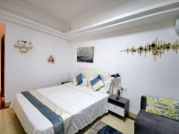 广州金色阳光国际公寓 - 现代轻奢巨幕大床房