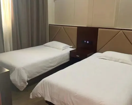 Hua Sheng Hotel Rooms Photos