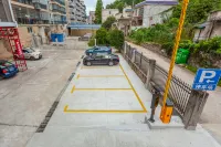 New Beacon International Hotel (Luotian Tashanhu Park) - parking