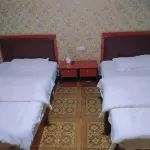 Shizhu Jiuhui Hotel - Inns