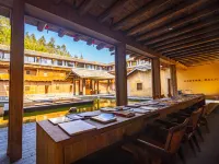 Yongding Earth Building Duilu · Shengheng Building World Heritage Home Stay Hotéis em Longyan