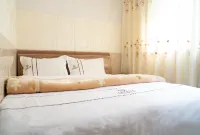 Qujing Rongfu Business Hotel - 2 tähden