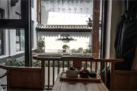 Windlnn.Boutique Garden Inn at Lijiang Old Town (South Gate) - ที่มีบาร์
