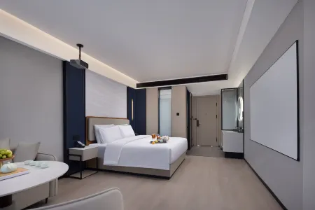 OKDAY Hotel (Xinyu Station Baoshi Park) Отели в г. Синьюй