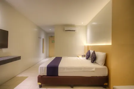 OYO 1066 Dorotello Apartelle Отели в г. Кейнта