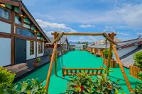 야시 호텔 (리장 고성 다수이처 지점) 리장 고대 도시 라이온 마운틴 전망대 주변 호텔