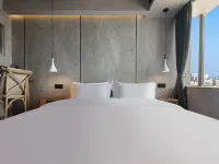 泥木·SKY CITY HOTEL(宜賓站西站店) 宜賓住宿飯店