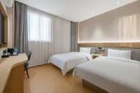 Yiju Jinpai Qidong Wenfeng Dashijie Hotel Hotels in Qidong