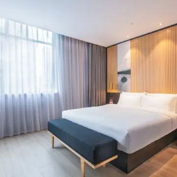 Orange Hotel (Wuhan Qingnian wansongyuan Road) Отели рядом с достопримечательностью «Начальная Школа Авиадороги»