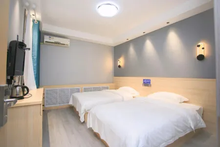 Tongchuan Yijiaguest Hall Отели рядом с достопримечательностью «Tongchuan Polytechnic»