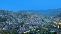 Xijiang Qianhu Miaozhai Jupenglai Homestay - pemandangan pegunungan