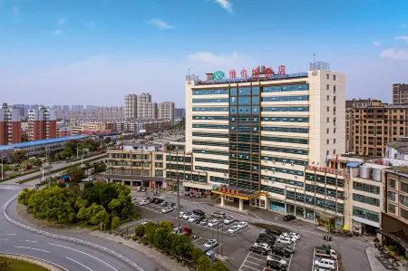 Vienna Hotel (Suining Central Street East Ring Island Branch) Отели в г. Суйнин