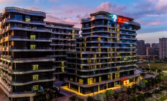 Kew Green Hotel (Haikou cdf International Duty-Free City Xinhaigang Pier)