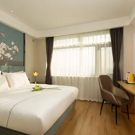 Magnotel Hotel (Feicheng Xinhua Building)