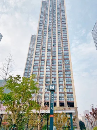 Hailun Guangchang Fushi Yingyuan Apartment (Jiangxia Keting Subway Station) Отели рядом с достопримечательностью «Wuhan University of Engineering Science»