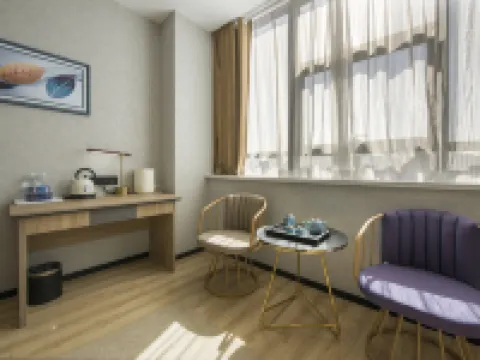 辰泰アートホテル（クムル駅） クムル市のホテル