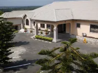 Nesville Suites Hoteles cerca de Big Qua Shopping Complex