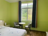 Pengzhou Bailuzhen Xiyou Homestay Hotels near Bailu Town