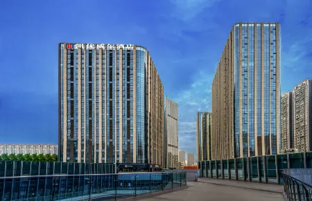 Theme Care U Well Hotel (Chengdu East Railway Station 468) Отели рядом с достопримечательностью «Sichuan Normal University (East Campus)»