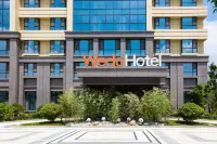 Latitude World Hotel (Laixi Jiangshan Toll Gate) فنادق في لايشي