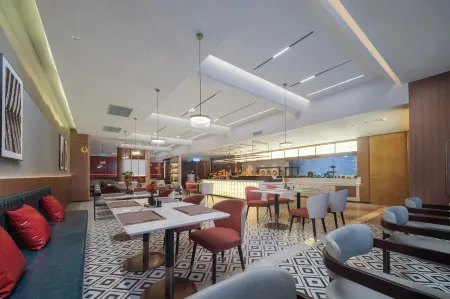 Changchun Guanggu Street Atour S Hotel Отели рядом с достопримечательностью «Changchun Wuhuan Gymnasium»