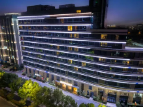 Wuyin Liangju Hotel (Hangzhou Future Science Town Hangzhou Normal University) โรงแรมใกล้สวนสาธารณะอลิบาซิ