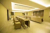 โรงแรมโฮมอินน์ พลัส (ห้างสรรพสินค้าวั่นด้า หยุนหลง ซูโจว) - ที่มีที่จอดรถ