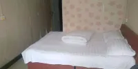 Zhengzhou Xiaoai Apartment - Zimmer Mit Queensize-Bett