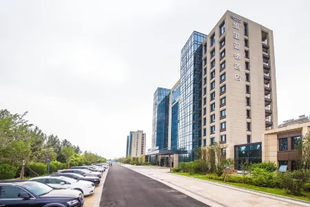 Kyriad Hotel (Qinhuangdao Nandaihe Branch) Отели рядом с достопримечательностью «Hebei Institute of International Business and Economics - Comprehensive Building»