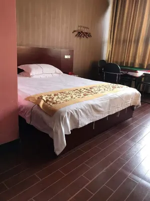 Wanzai Xincheng Business Hotel