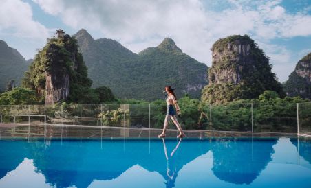 New West Street Hotel (Yangshuo Yitian West Street Li River) - Housity