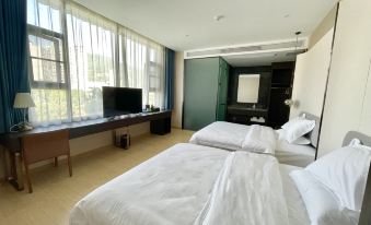 Home Inn UP Huayi Element Boutique Hotel (Wanyuan Railway Station Branch)