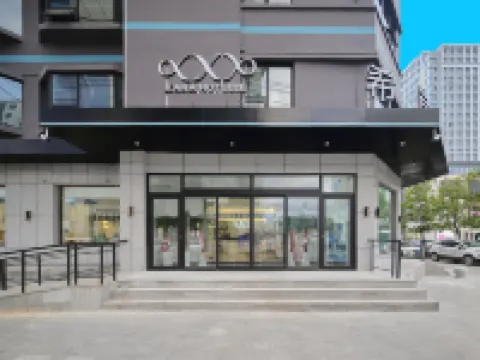 Xana Hotelle Hotel (Yanji Yanbian University Baihuo Building) Hotels in Yanji