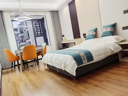 Quxian Jiaxin Business Hotel Отели рядом с достопримечательностью «Wenfeng Mountain Cultural Tourism Scenic Area»