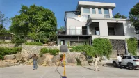 Xiaoquan Shishanju 바난 구 당 학교 주변 호텔
