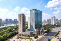 Rezen Longuu Hotel (Dengzhou Municipal Government & Tuanhe National Wetland Park Branch) - موقف سيارات
