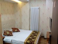 哈尔滨时间印象商务宾馆 - 普通大床房 (无窗)
