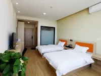 ORANGE HOTEL Hotels in Tailai