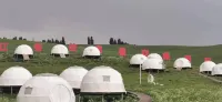 Qitai Jiangbulake Xingyu Xingkong Tent Homestay Отели рядом с достопримечательностью «Цзян Брак»